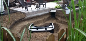 Pond expanded to paver patio