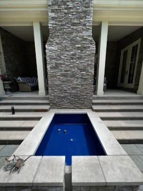 Pond expanded to paver patio