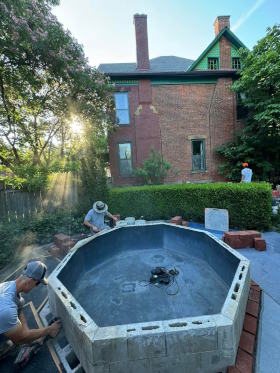 Pond expanded to paver patio