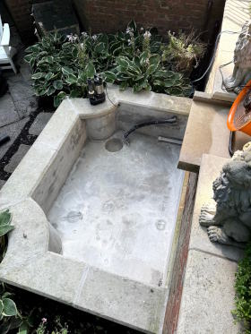 Liner removed from concrete lined stream