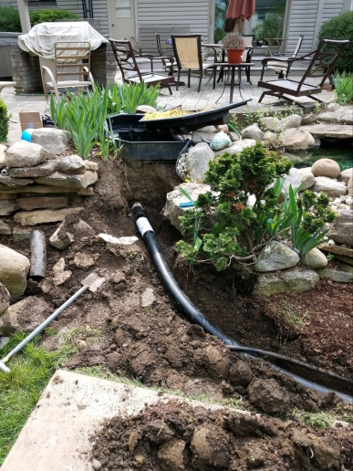 The water line feeding the pump has been exposed so it can be replaced